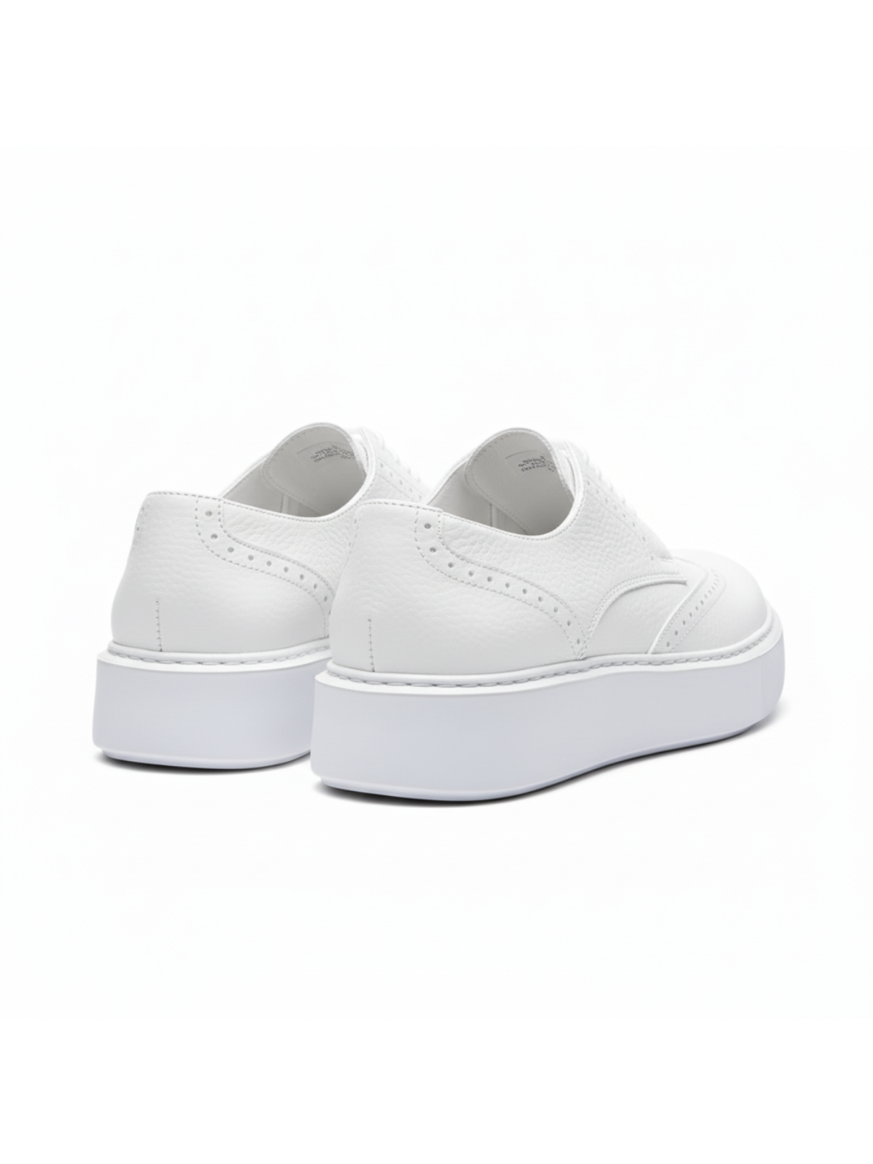 White sneakers on a white background