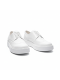 Pair of white sneakers on a white background